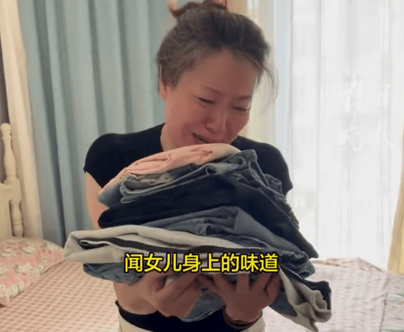 “女儿的衣服我不舍得洗<strong></p>
<p>迷你币</strong>，偶尔想回来闻一闻她的味道”